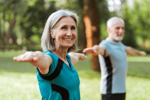 Couple stretching and smiling
